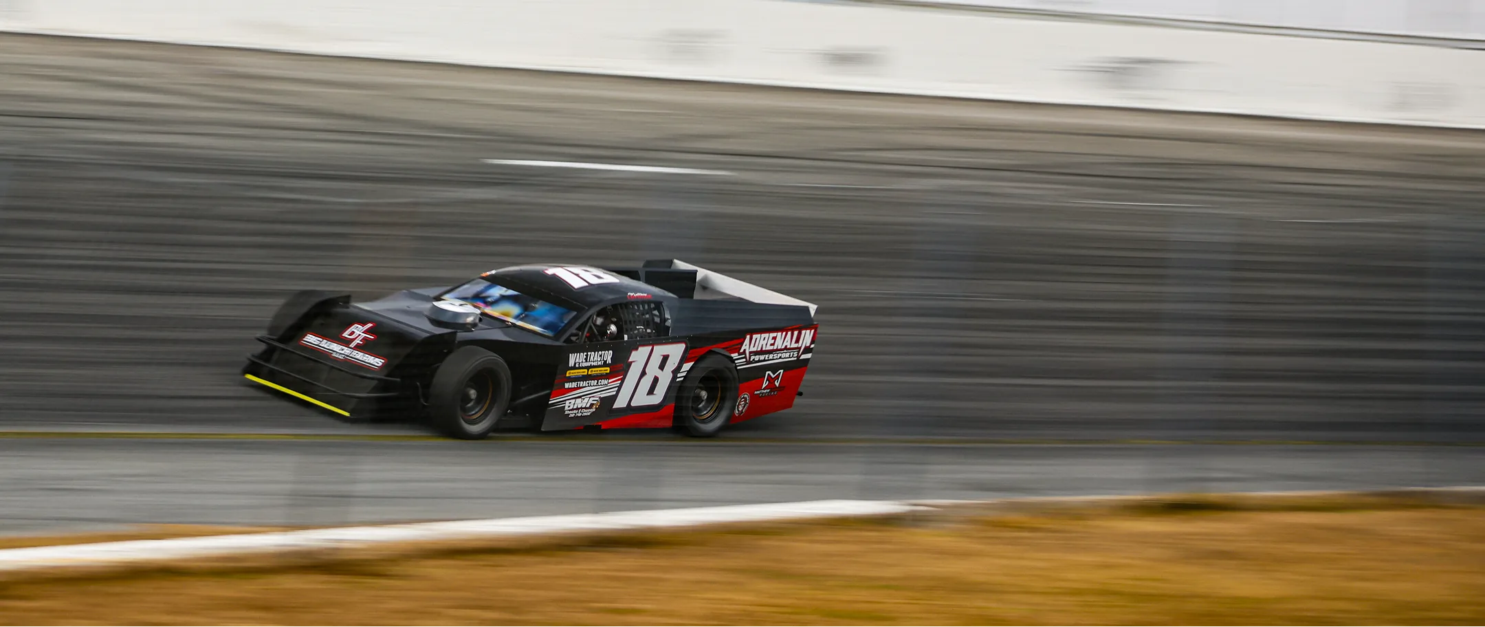 Matthew Laprade #18 modified at speed on the high banking